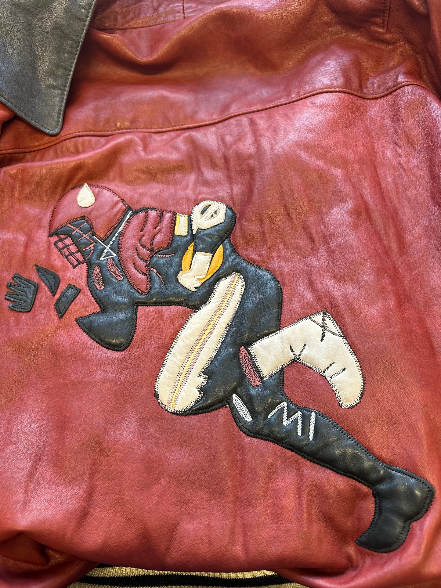 vintage NFL red and black leather bomber jacket