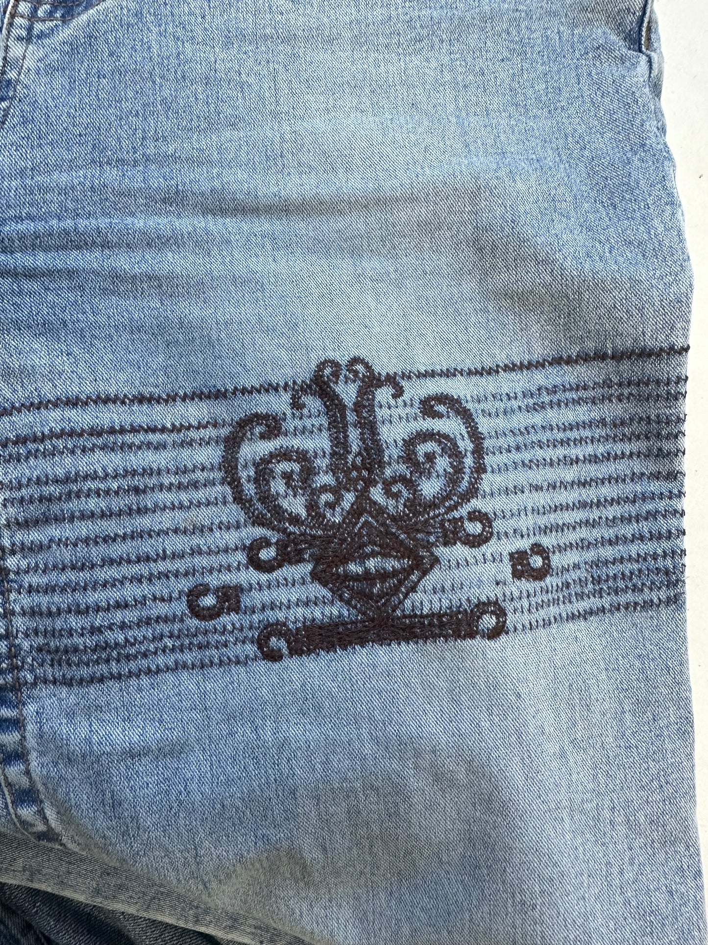 light wash embroidered flared jeans