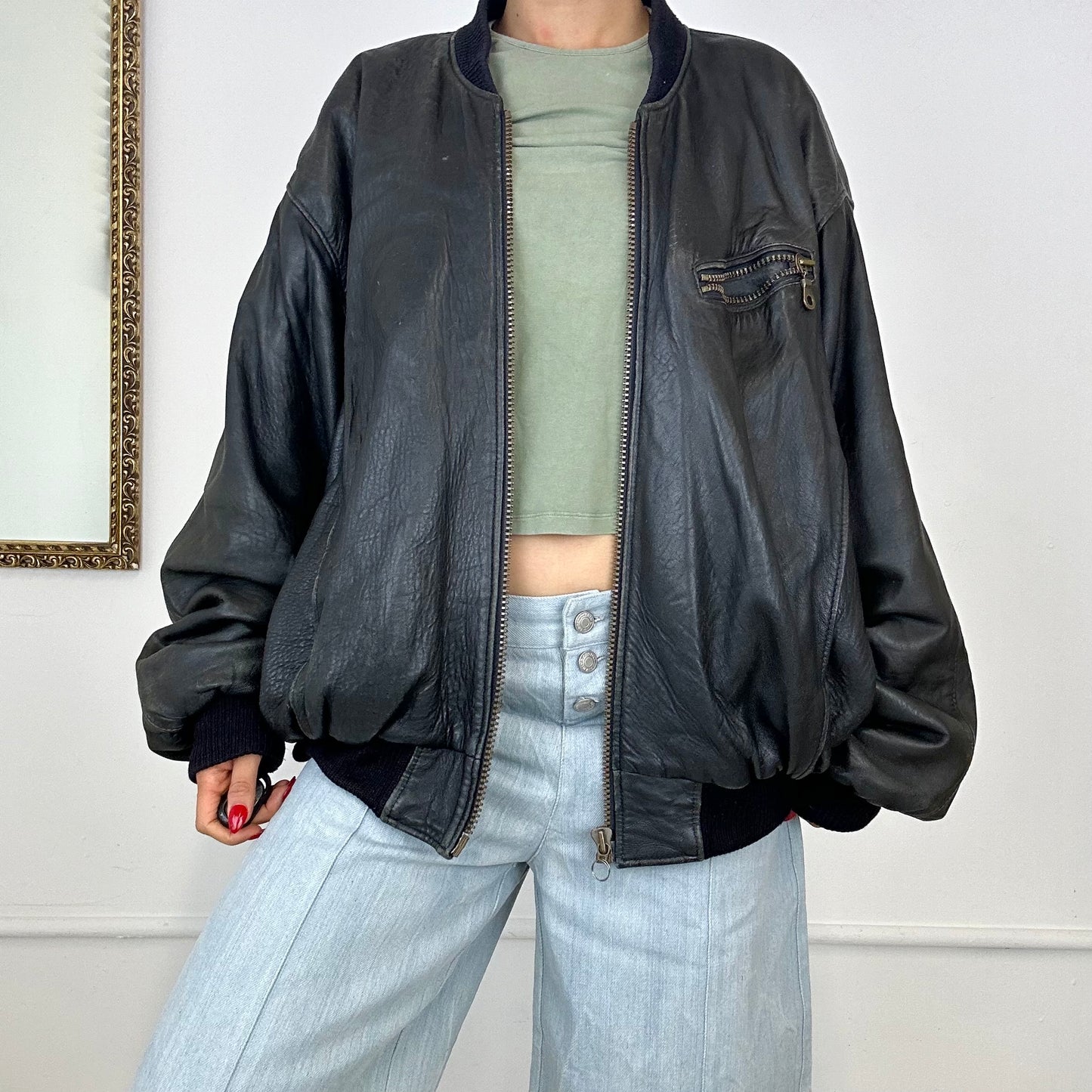 vintage dark leather bomber jacket