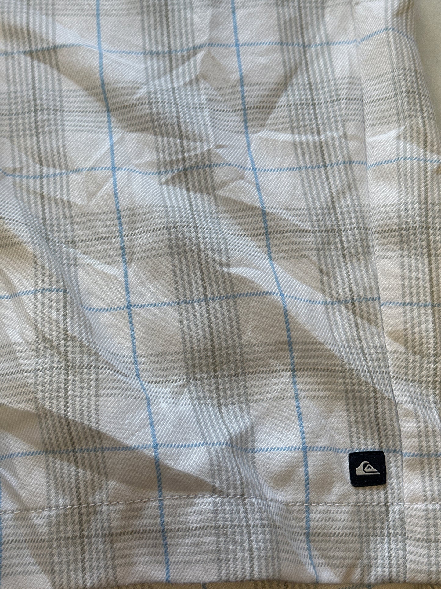 white checkered quiksilver long shorts