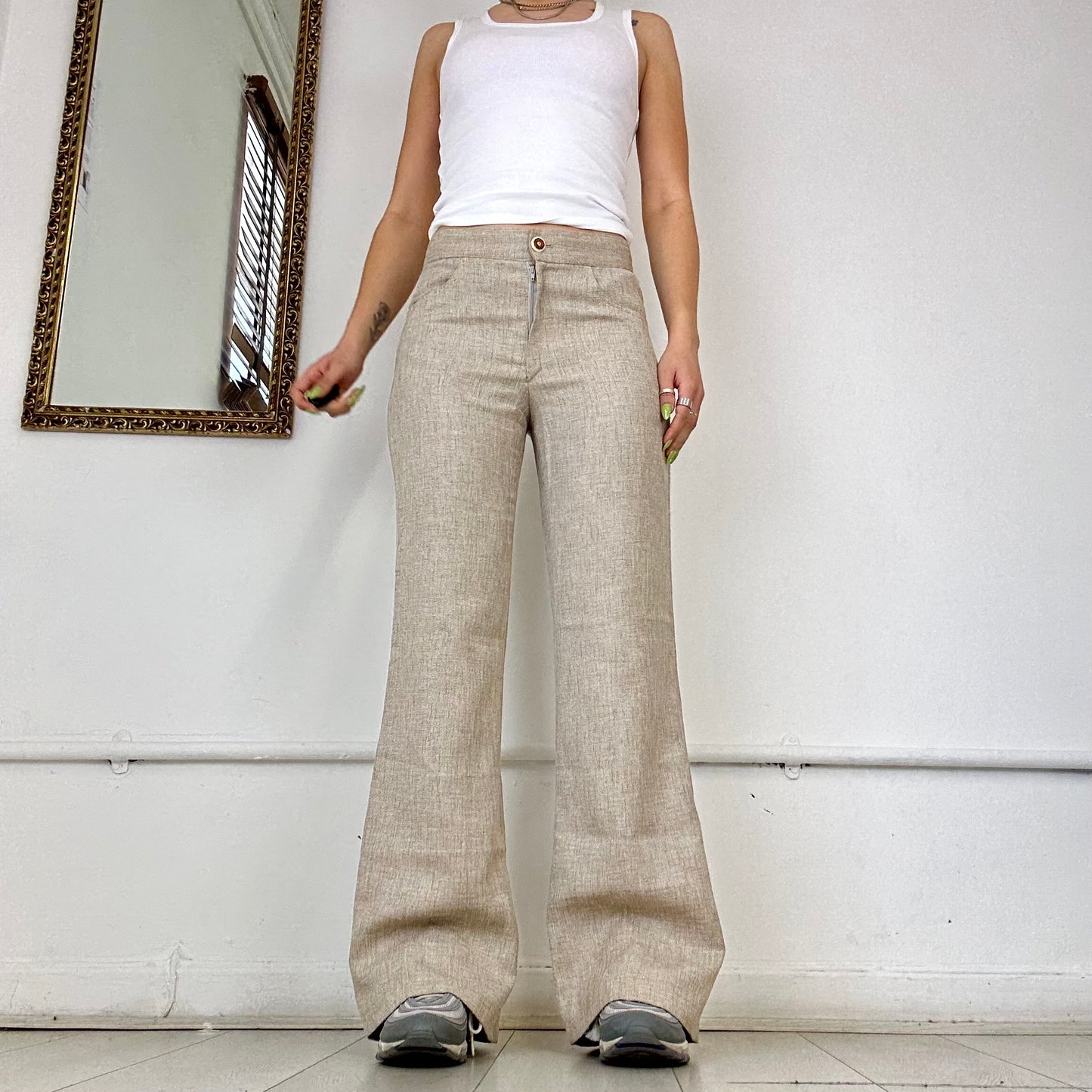 cream flared woven trousers