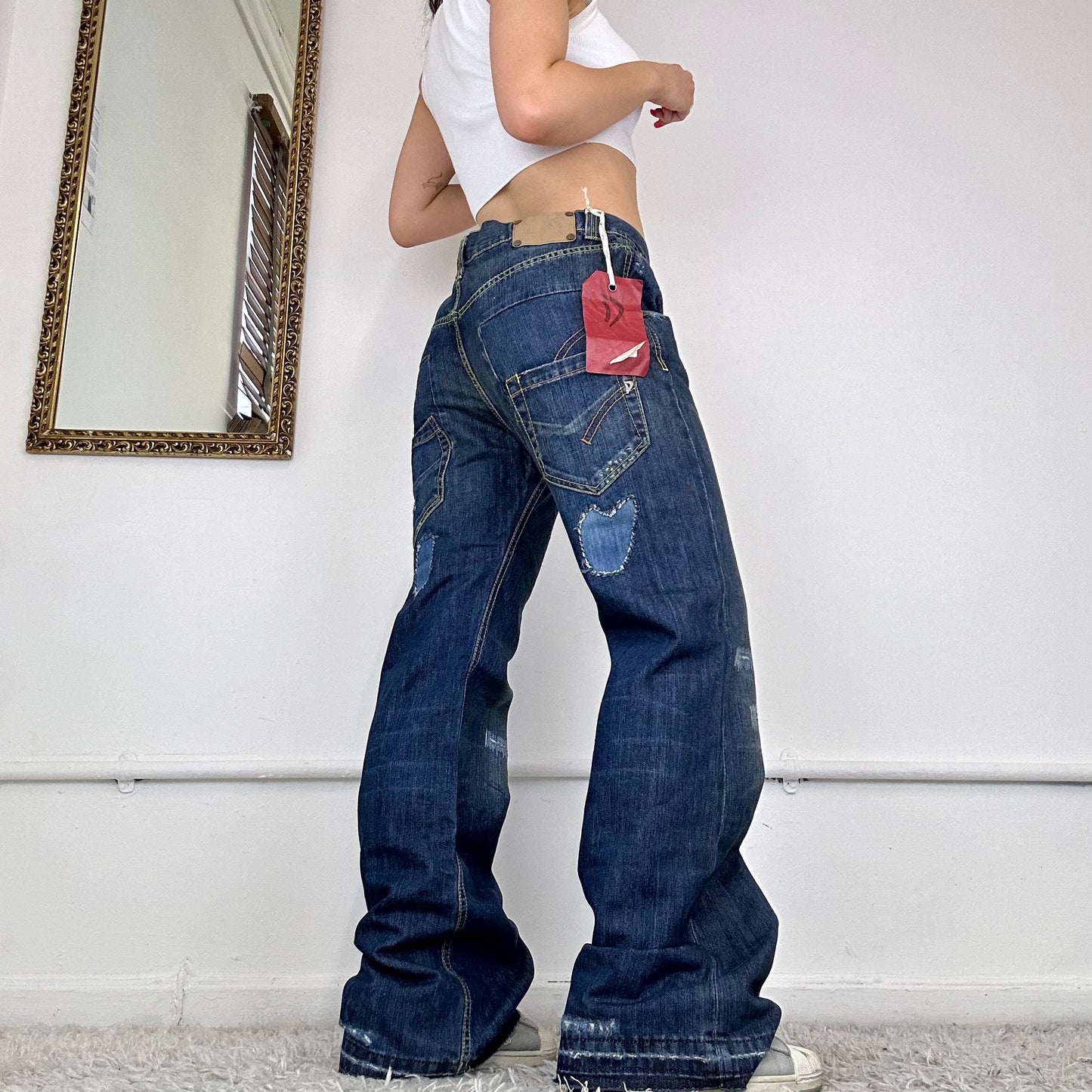 wide leg distressed jeans by dondup