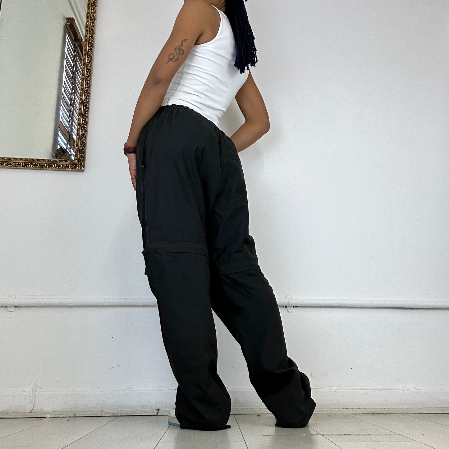 black zip off trousers