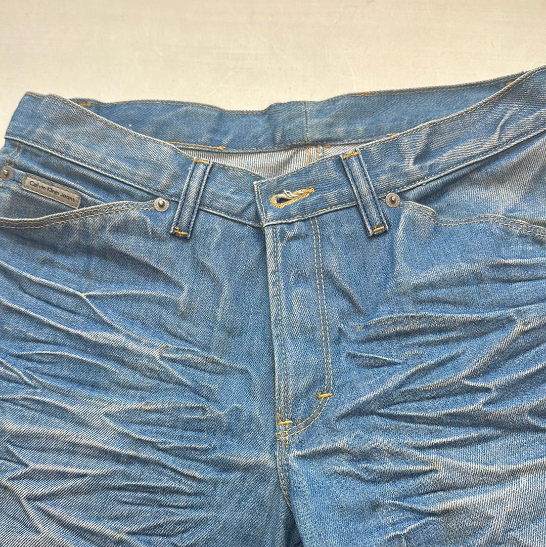 calvin klein mid wash flared jeans