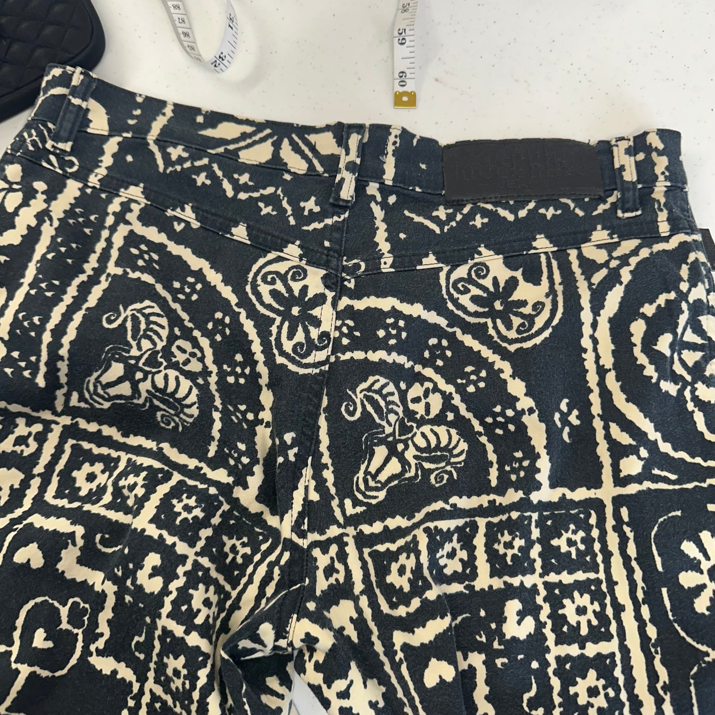 vintage moschino patterned flared trousers