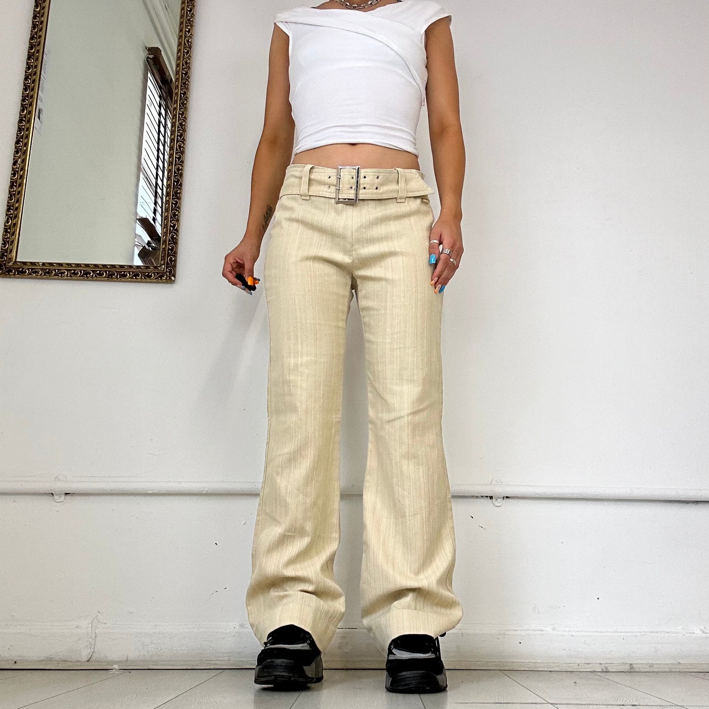 beige striped linen flared trousers