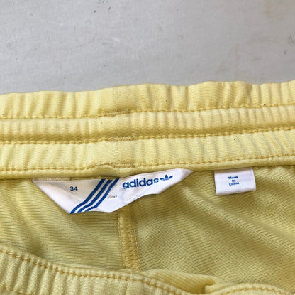 yellow adidas tracksuit bottoms