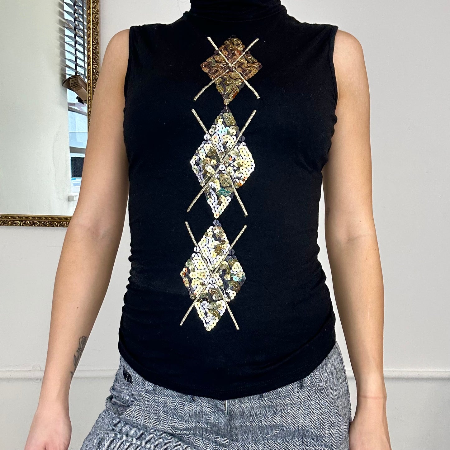 black sequined turtle neck top