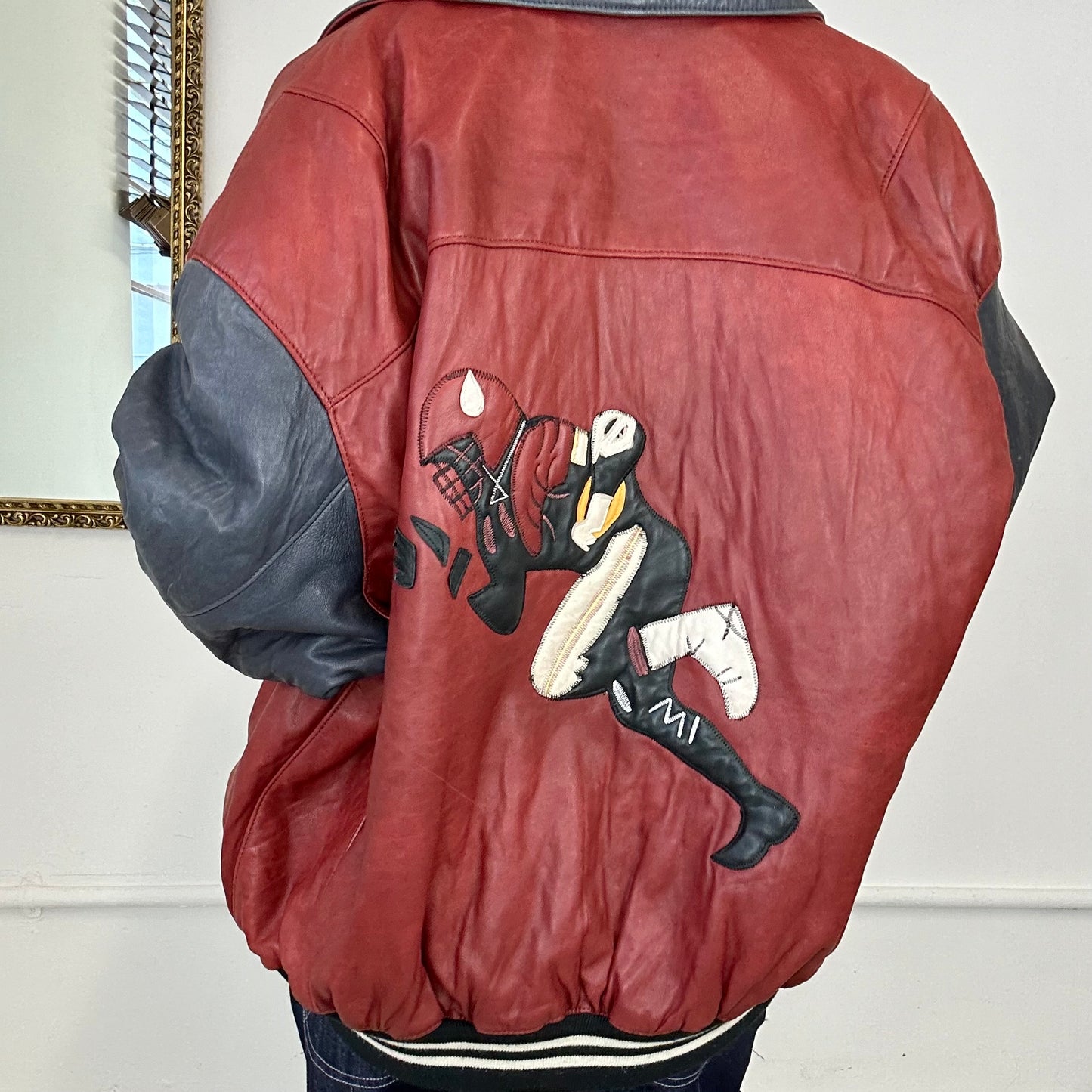 vintage NFL red and black leather bomber jacket