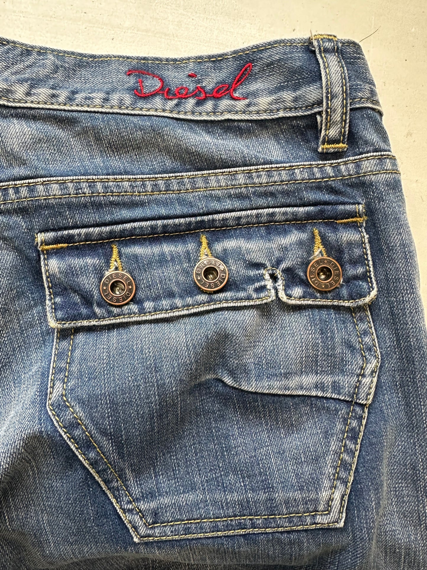 2000's mid wash diesel wide leg jeans