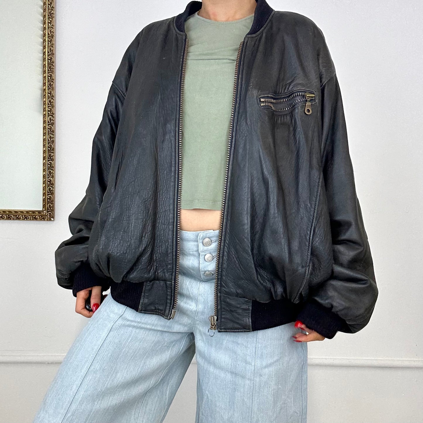 vintage dark leather bomber jacket