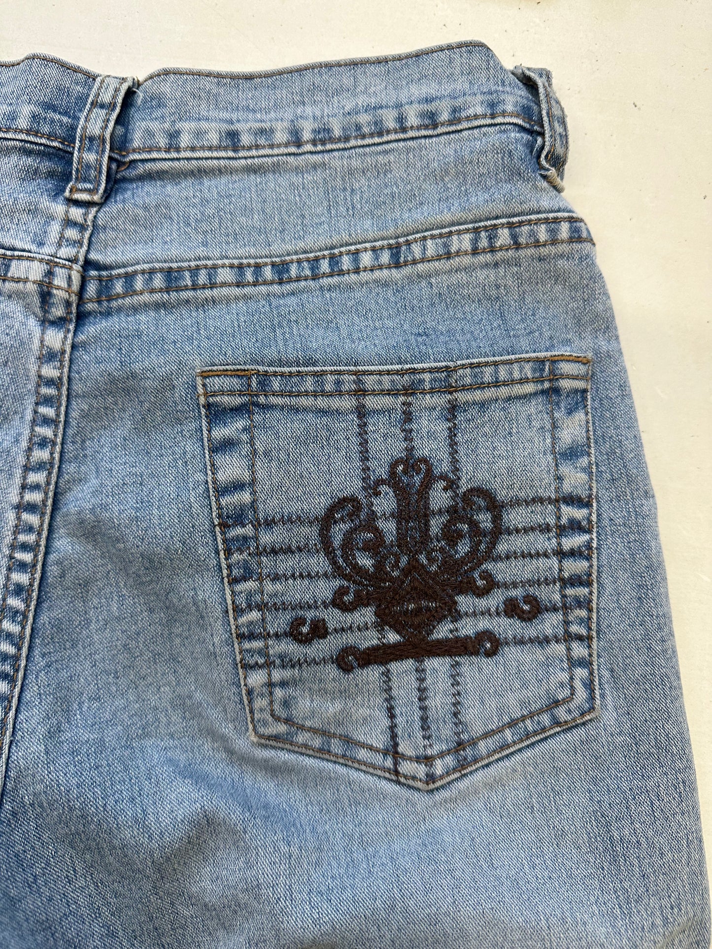 light wash embroidered flared jeans