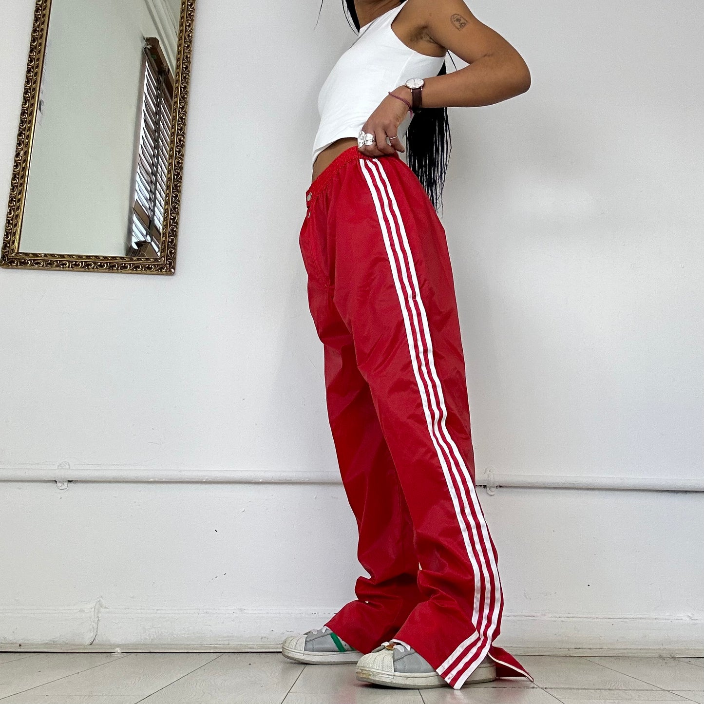 red adidas three stripe joggers