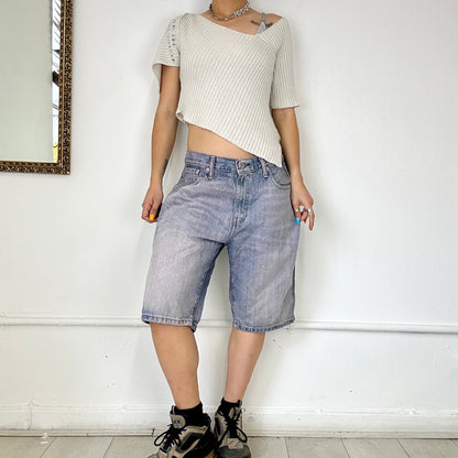 dusty pink toned levi's denim jorts