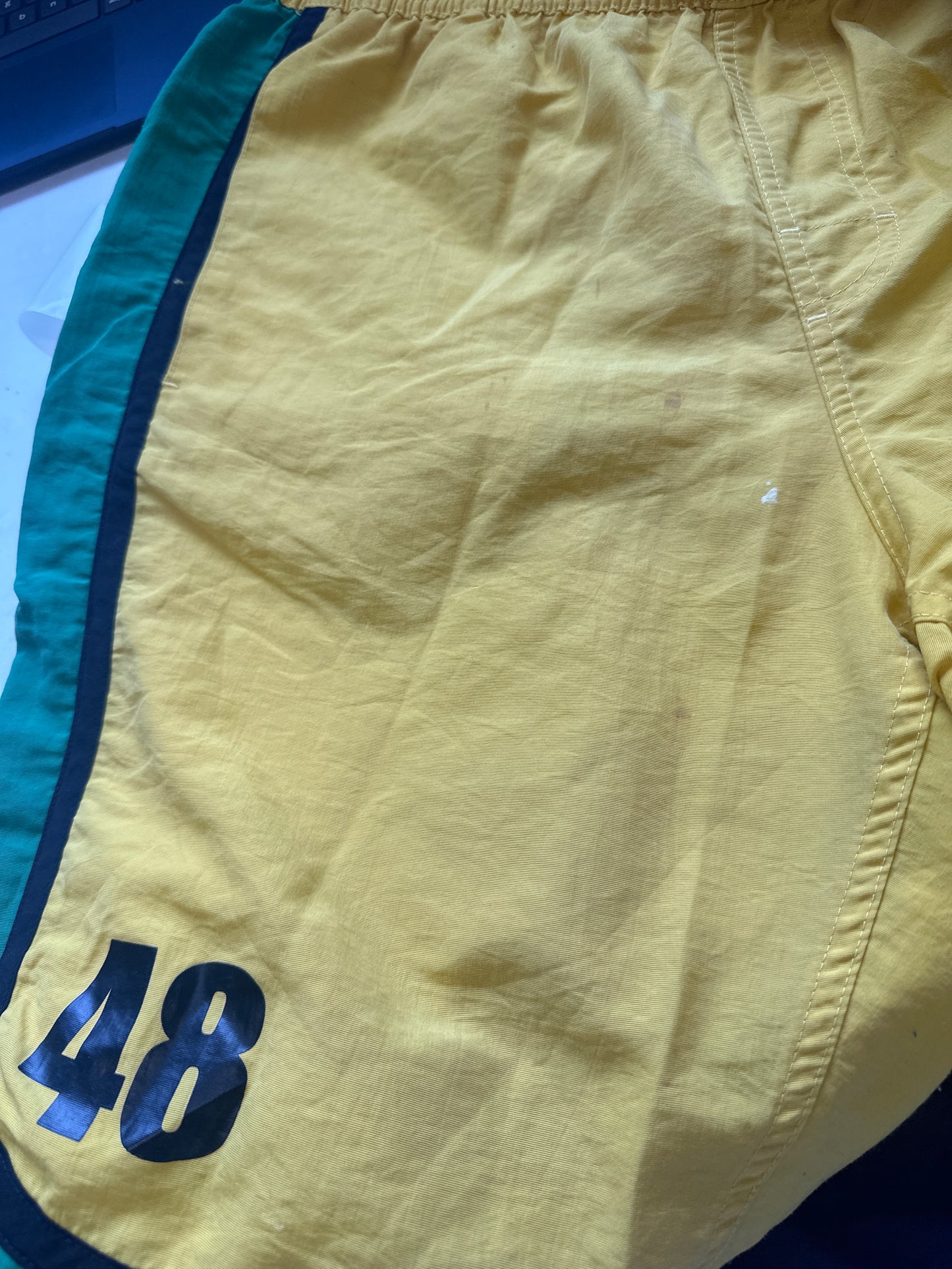 vintage yellow puma track shorts