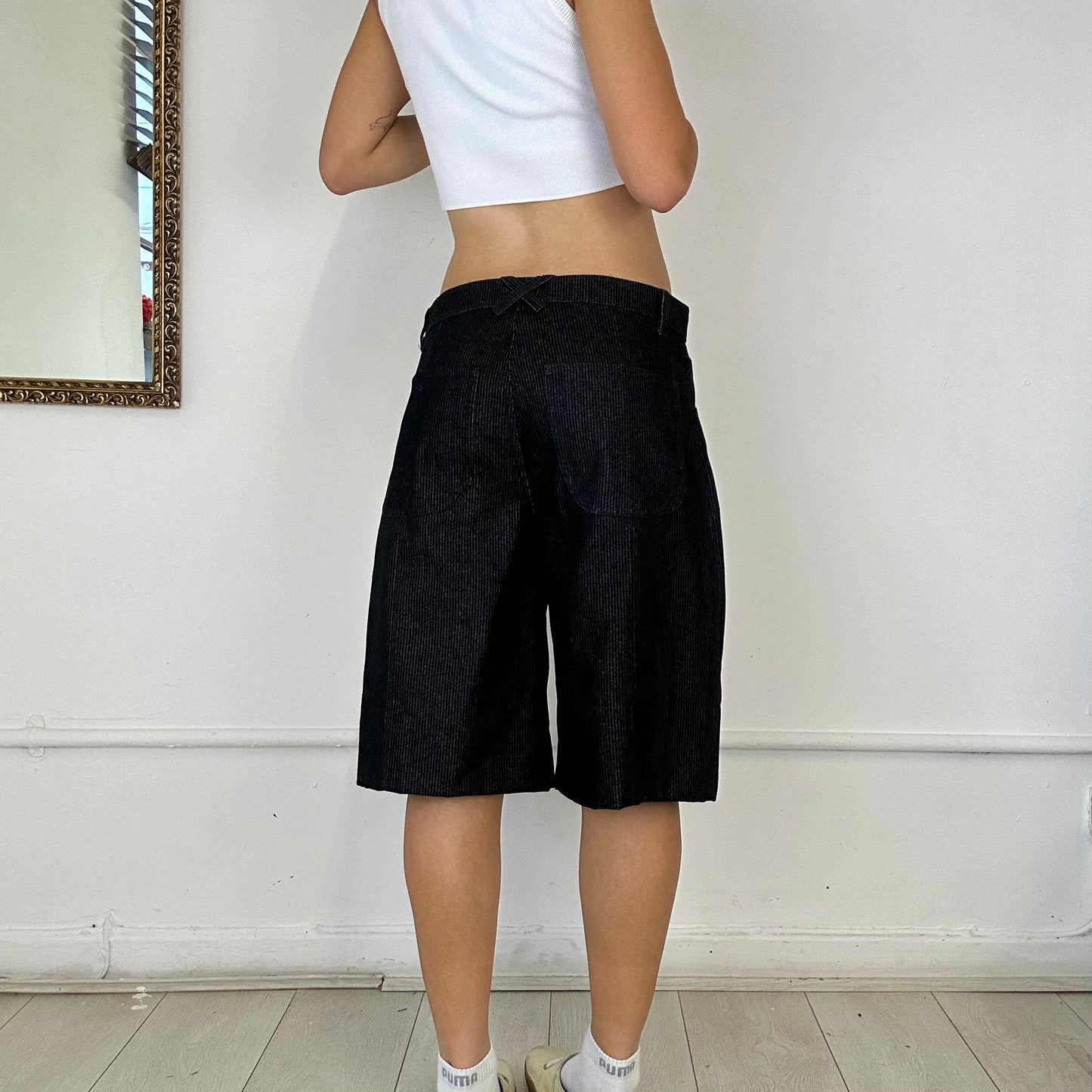 the skater short in black corduroy denim - size small - sample