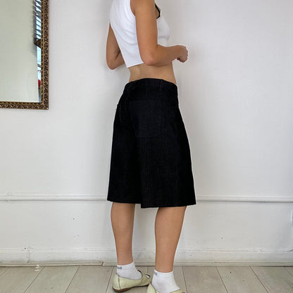 the skater short in black corduroy denim - size small - sample