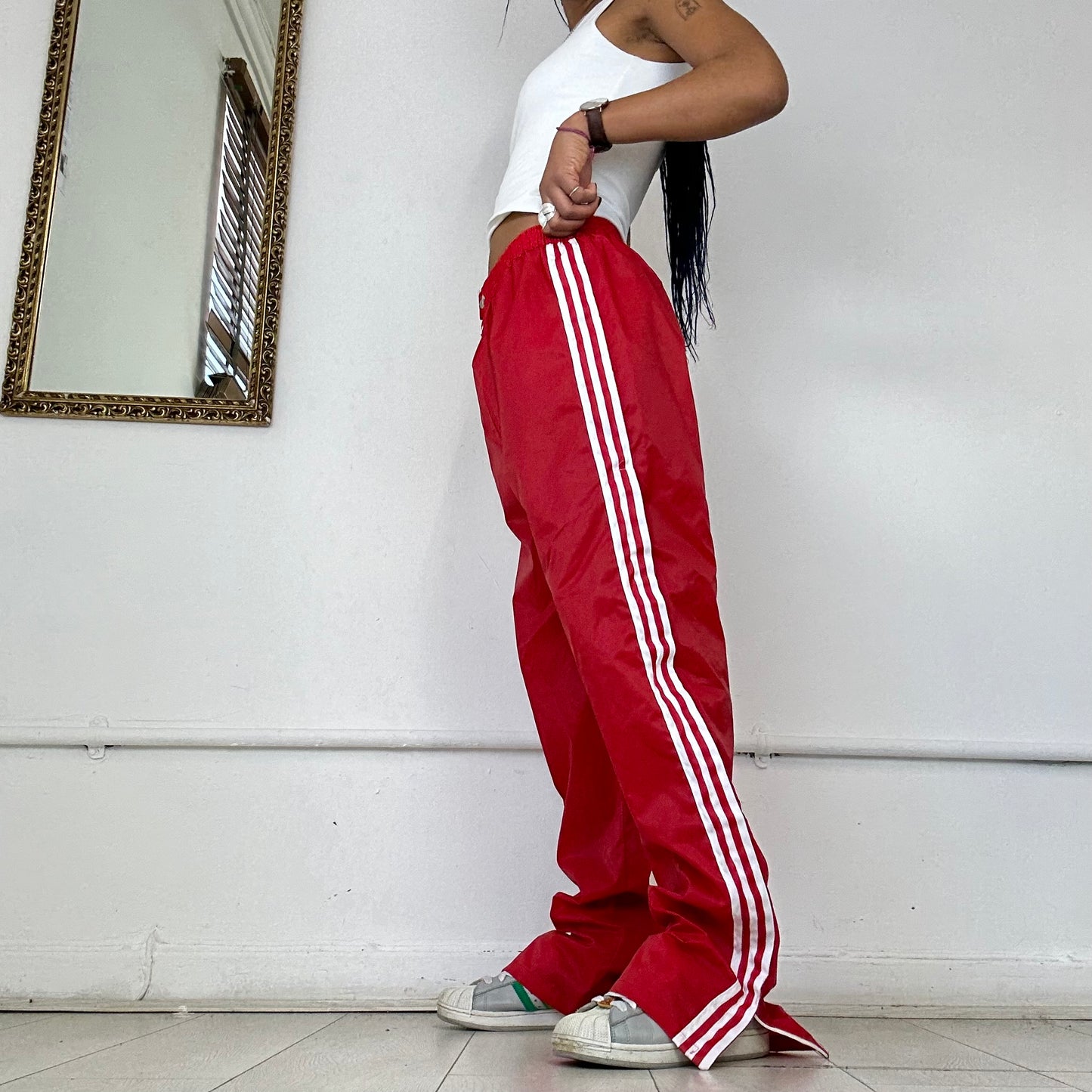 red adidas three stripe joggers