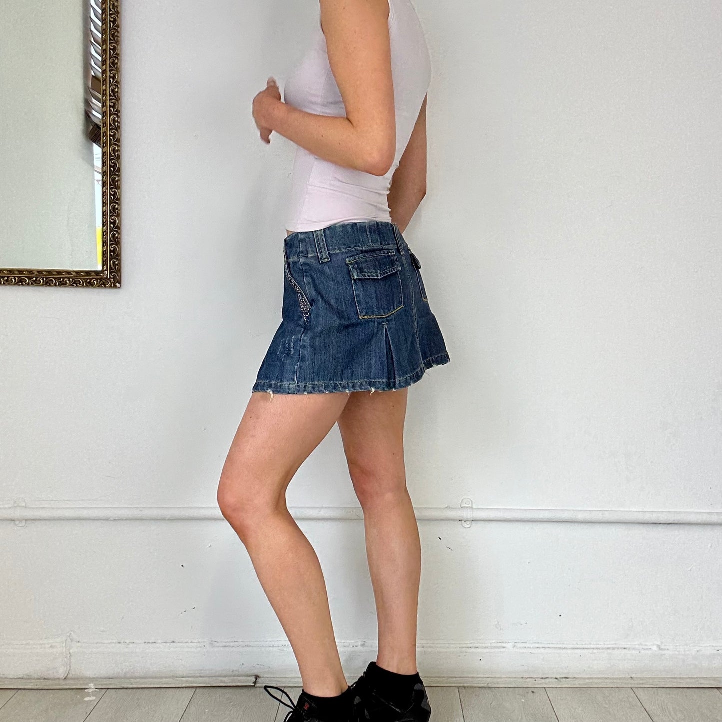 pleated denim mini skirt