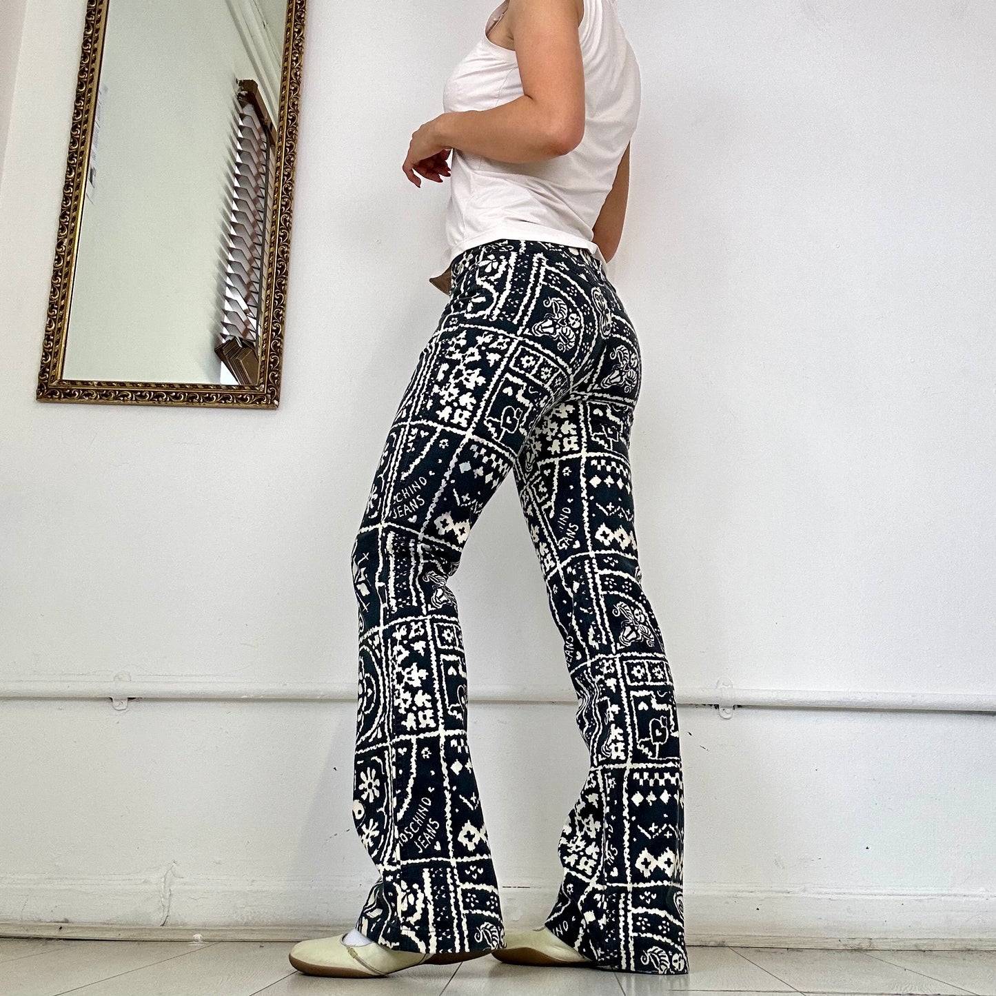 vintage moschino patterned flared trousers