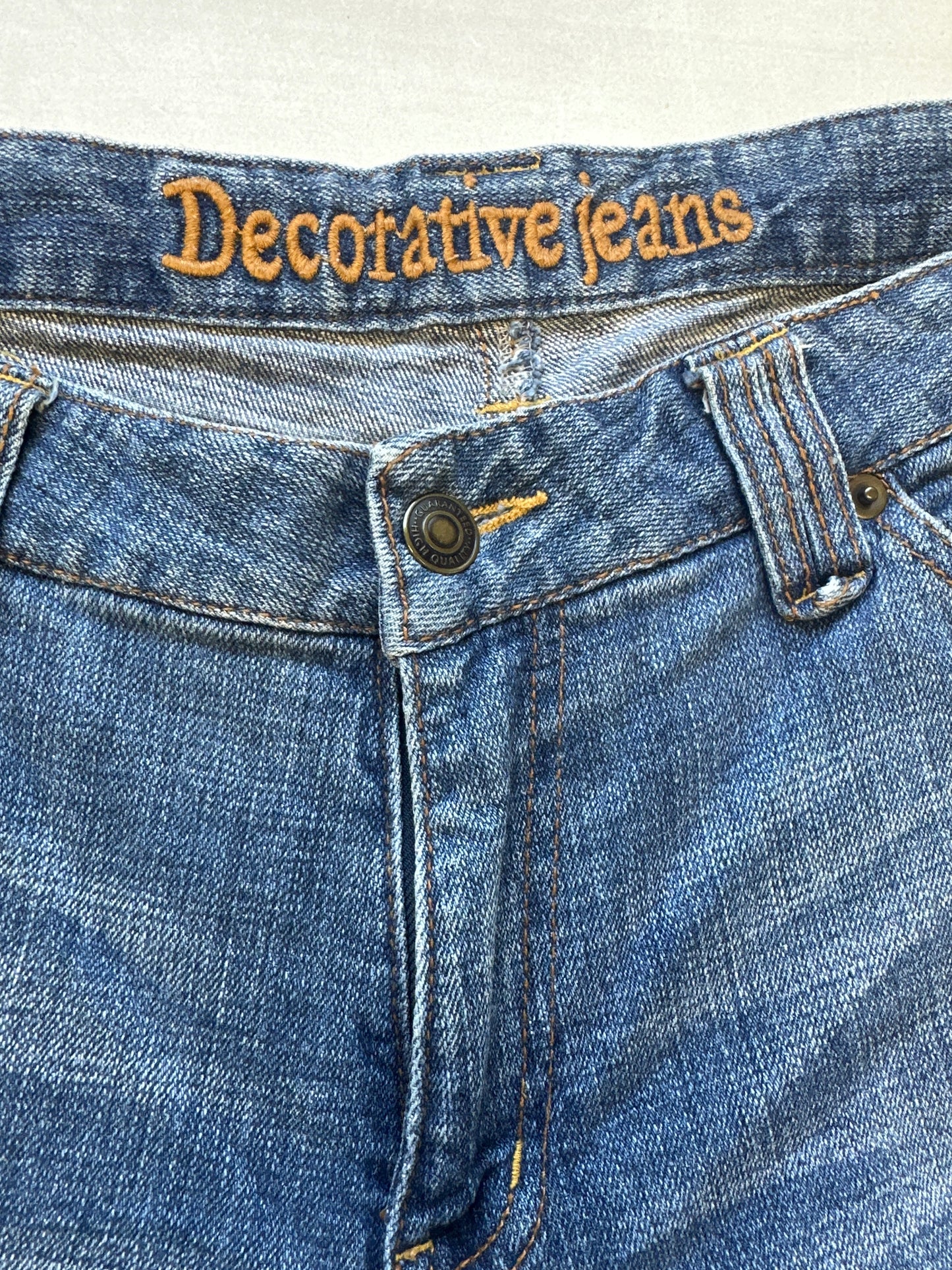 mid wash long denim shorts