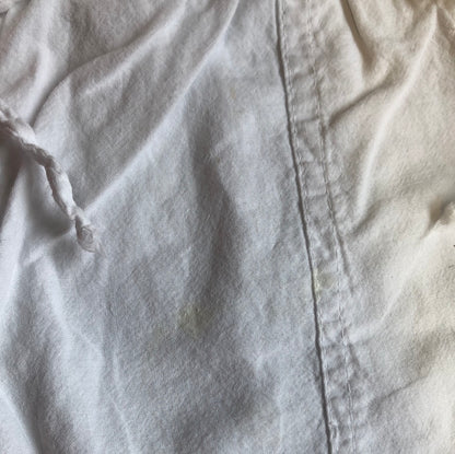 white linen capri trousers