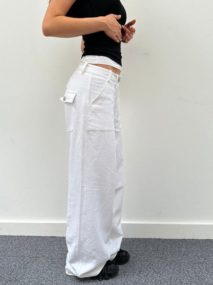 the slouch in white linen