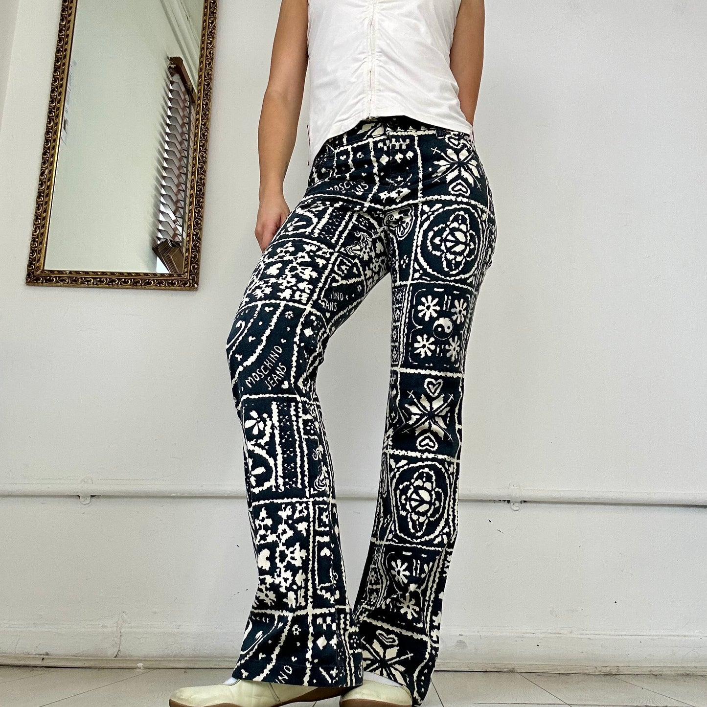 vintage moschino patterned flared trousers