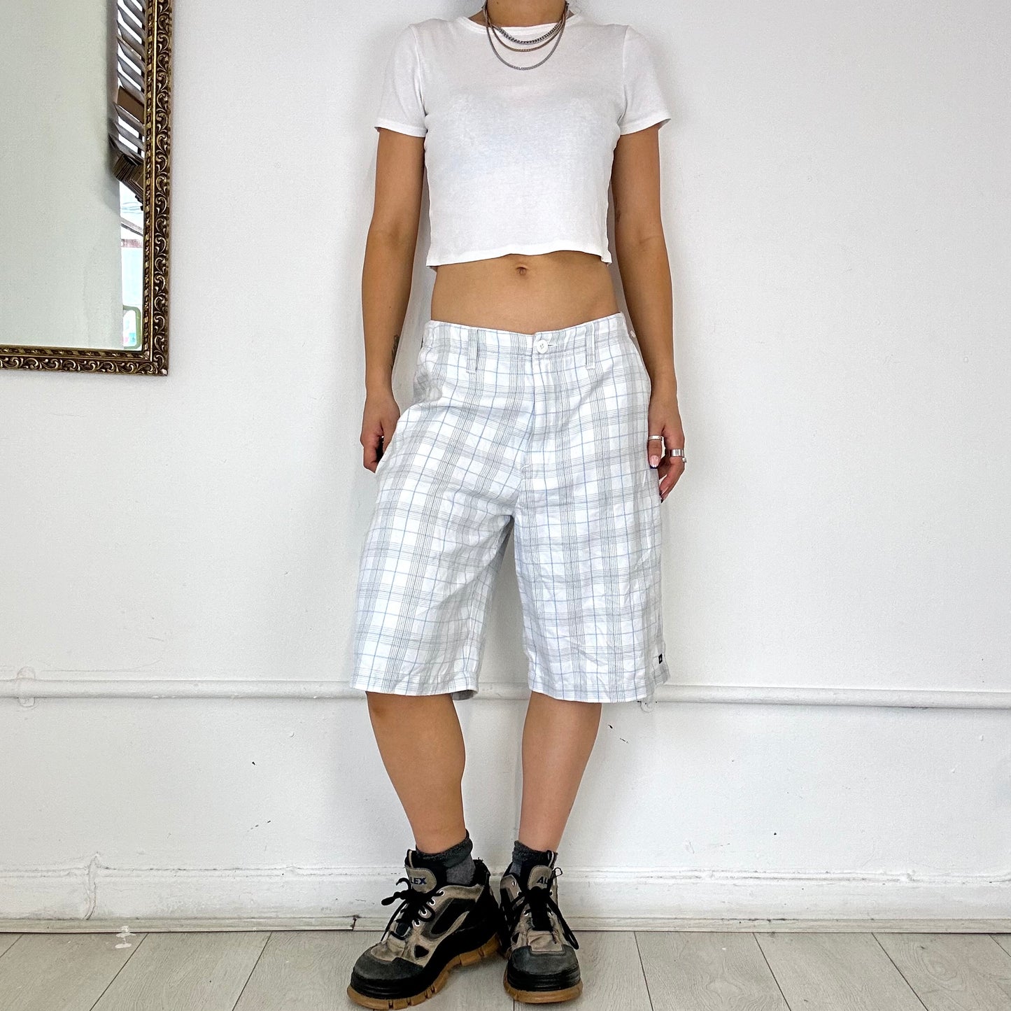 white checkered quiksilver long shorts