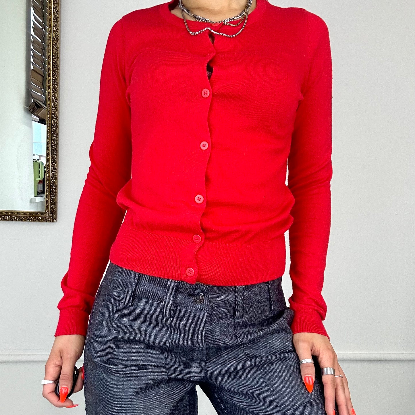 red knitted button up cardigan