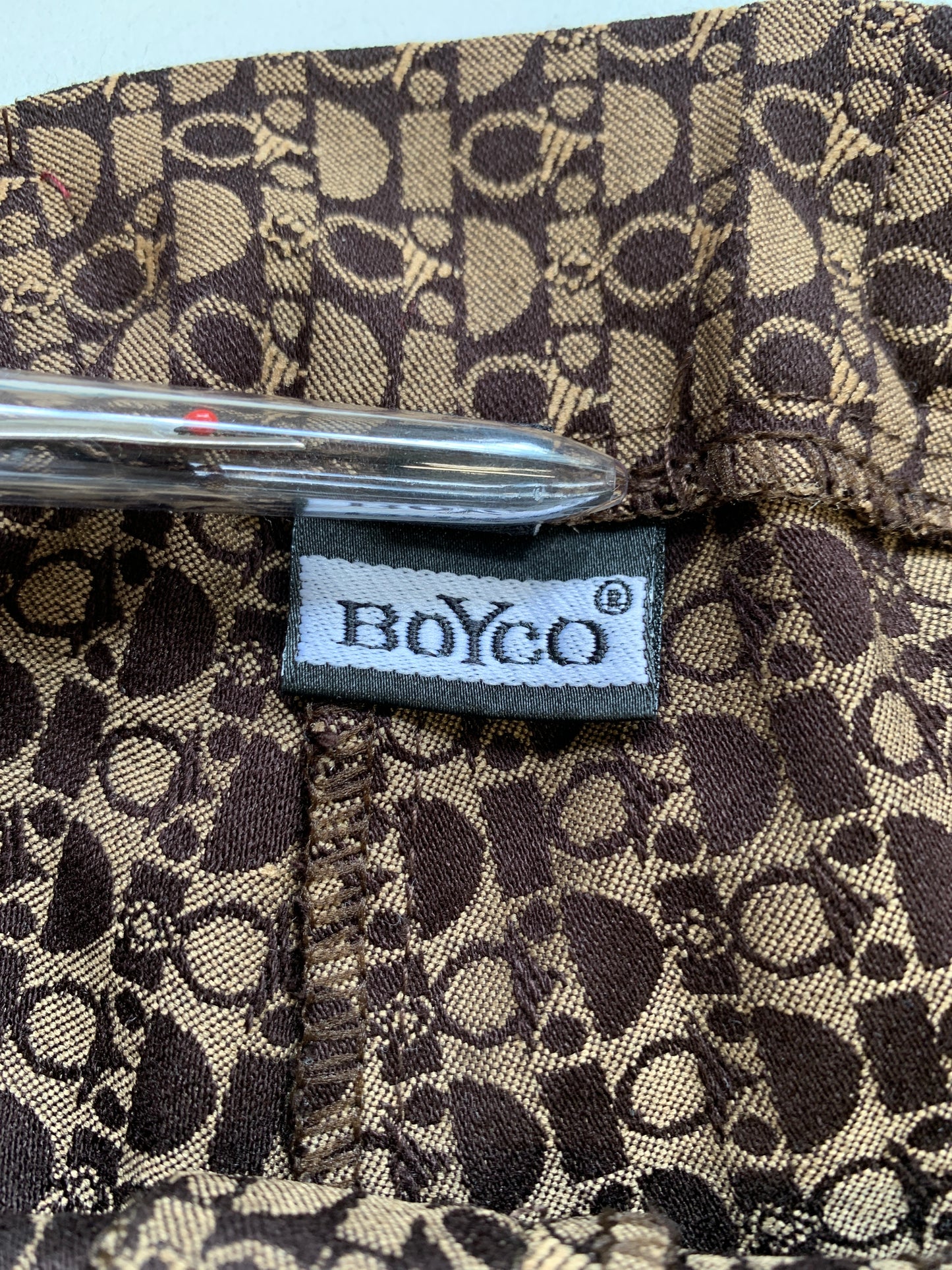 boyco italian flared printed monogram trousers