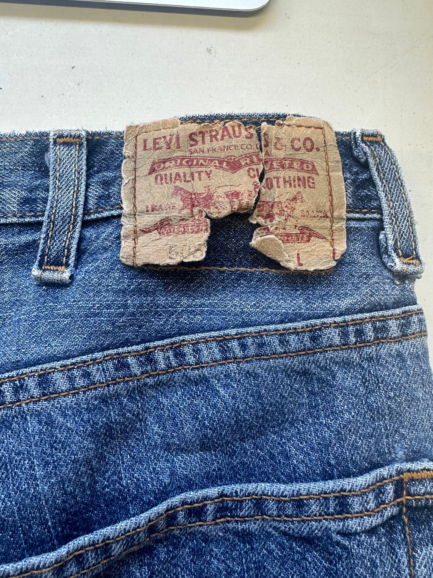 mid wash levis denim jorts