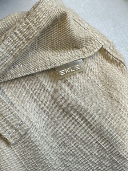 beige striped linen flared trousers