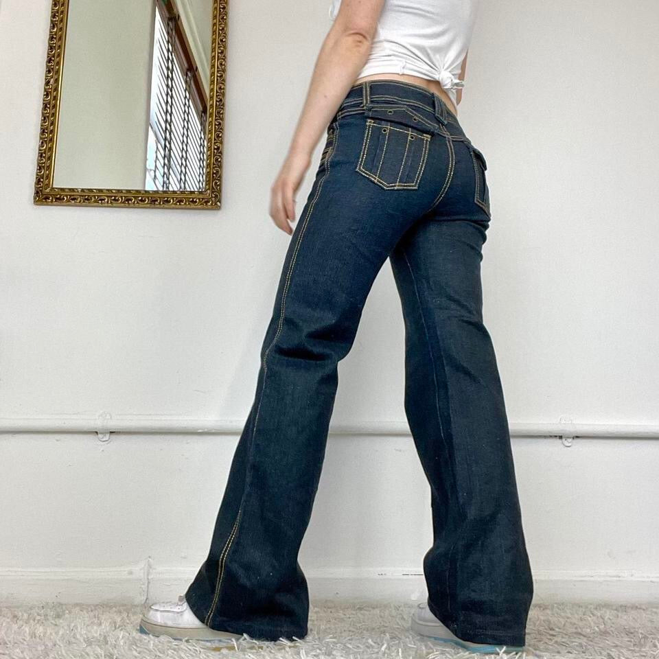 flared 2000s jeans with gold contrast