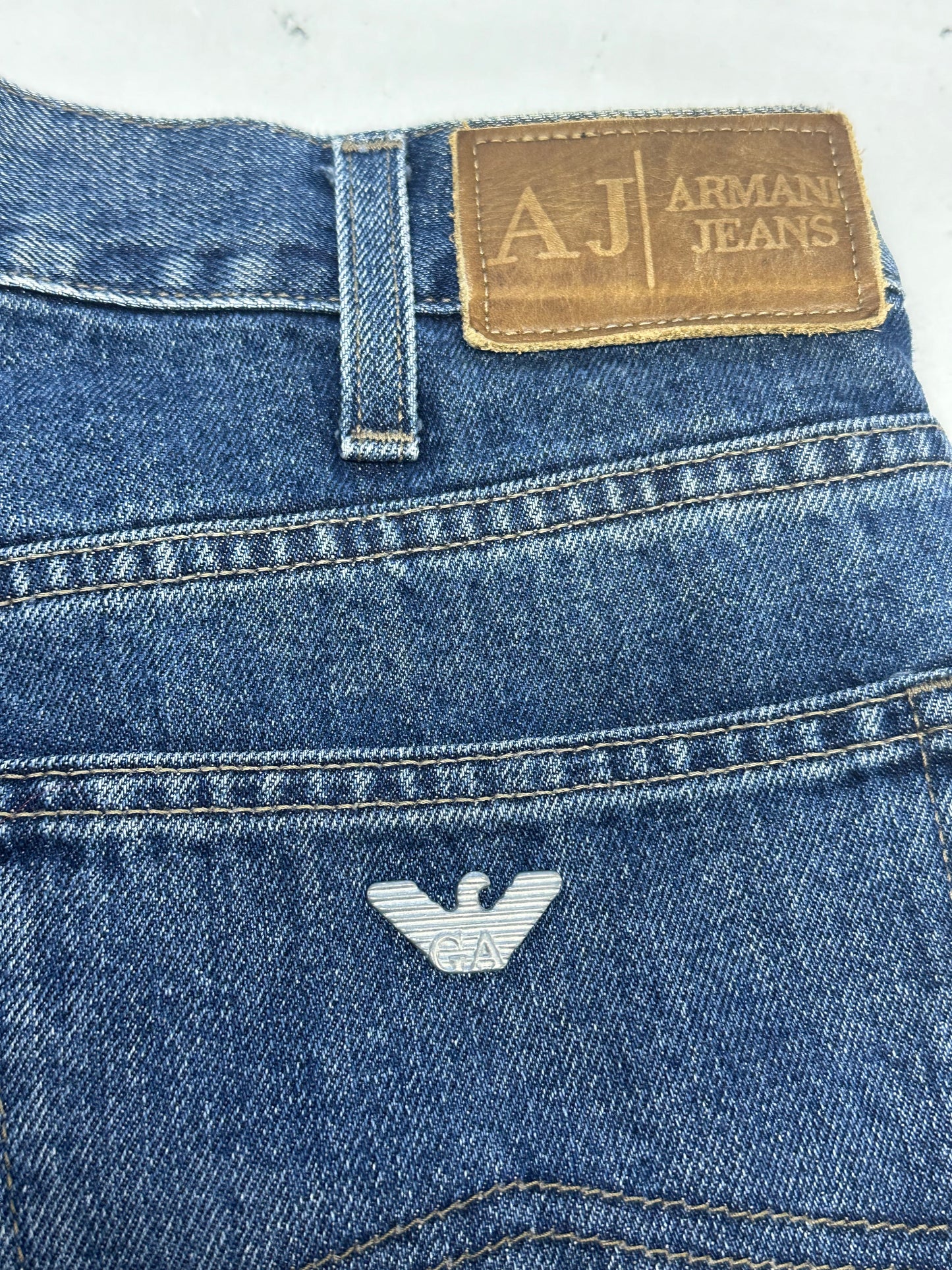 mid wash armani baggy jeans