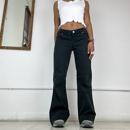 flared 2000's black jeans by phard