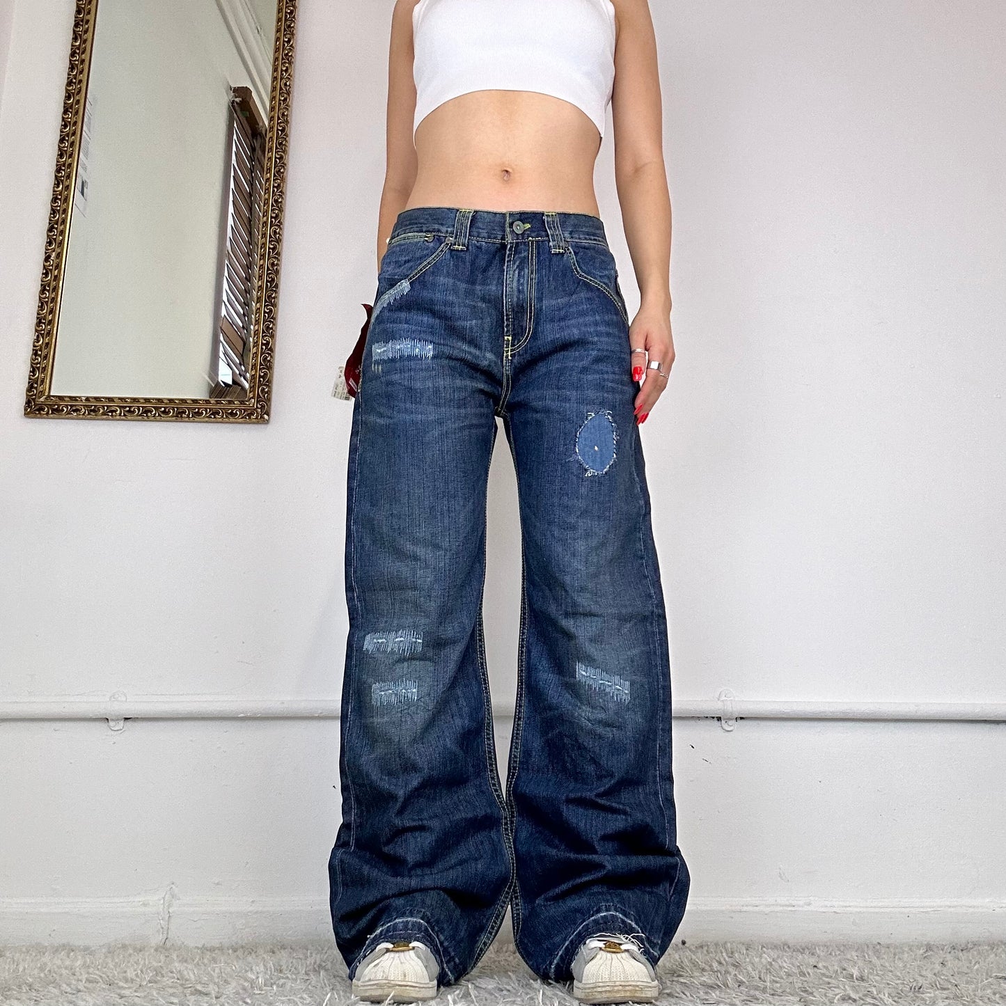 wide leg distressed jeans by dondup