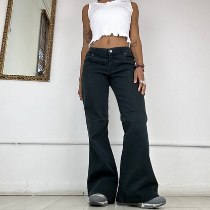 flared 2000's black jeans by phard