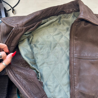 brown leather bomber jacket.