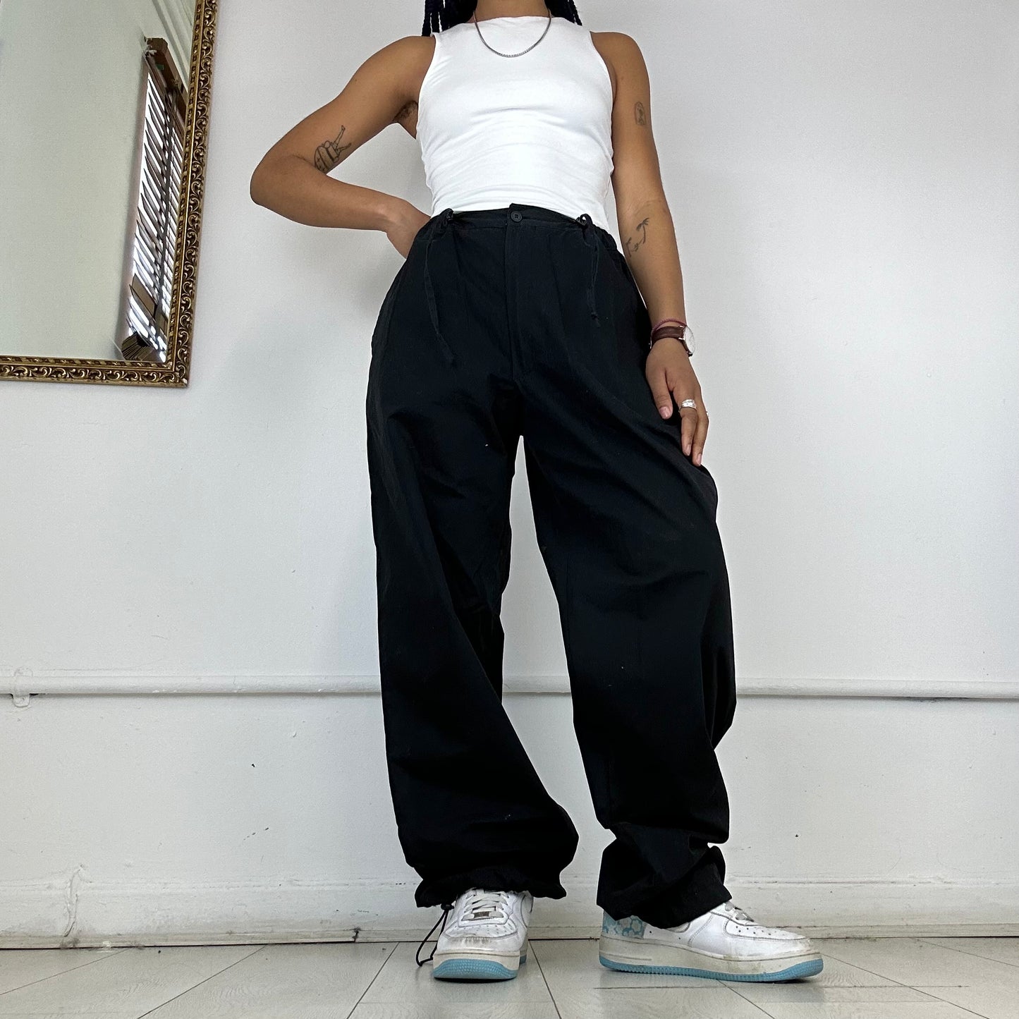 black parachute trousers