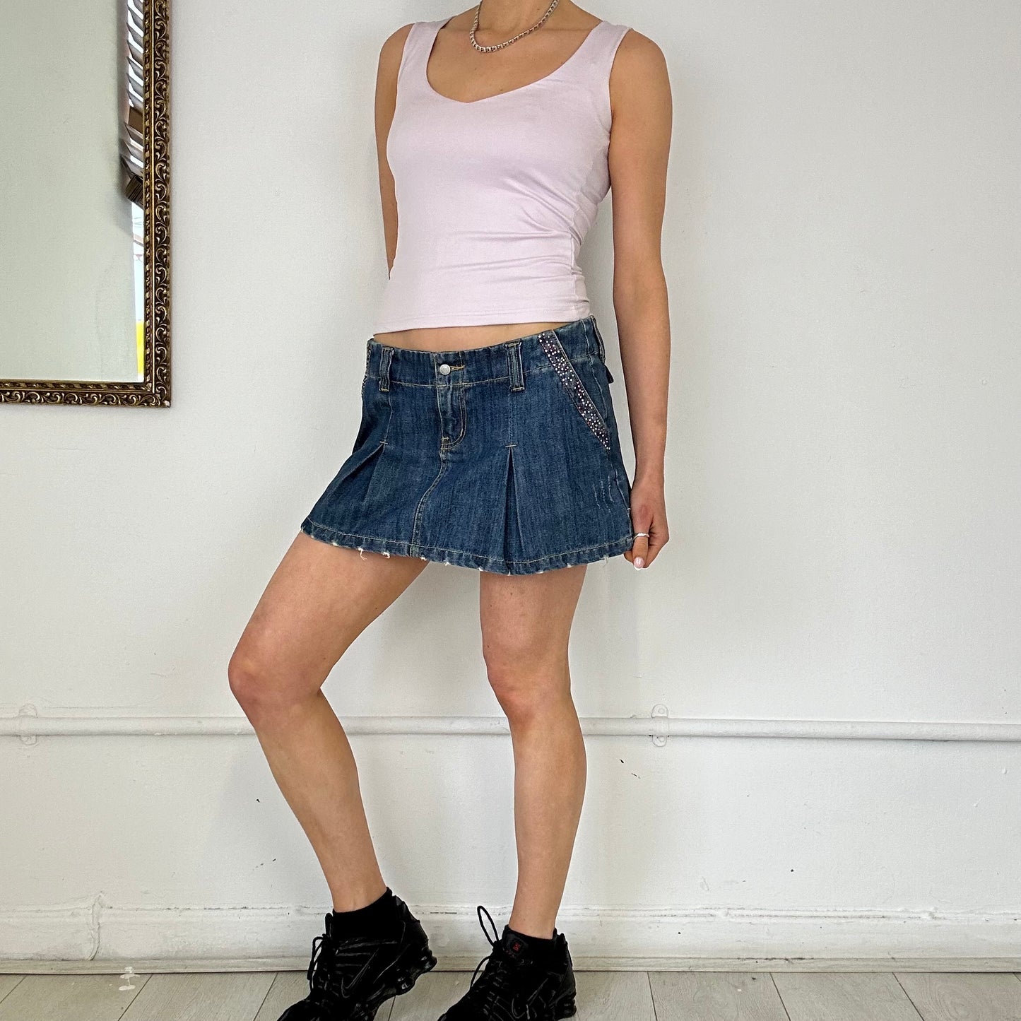 pleated denim mini skirt