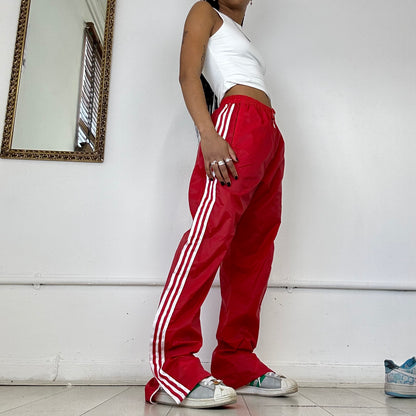 red adidas three stripe joggers