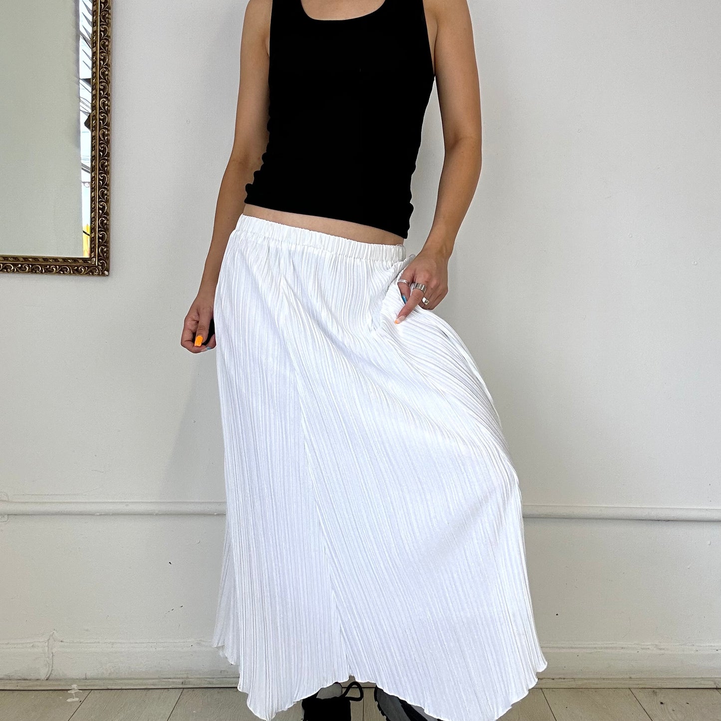 white flowy pleated maxi skirt