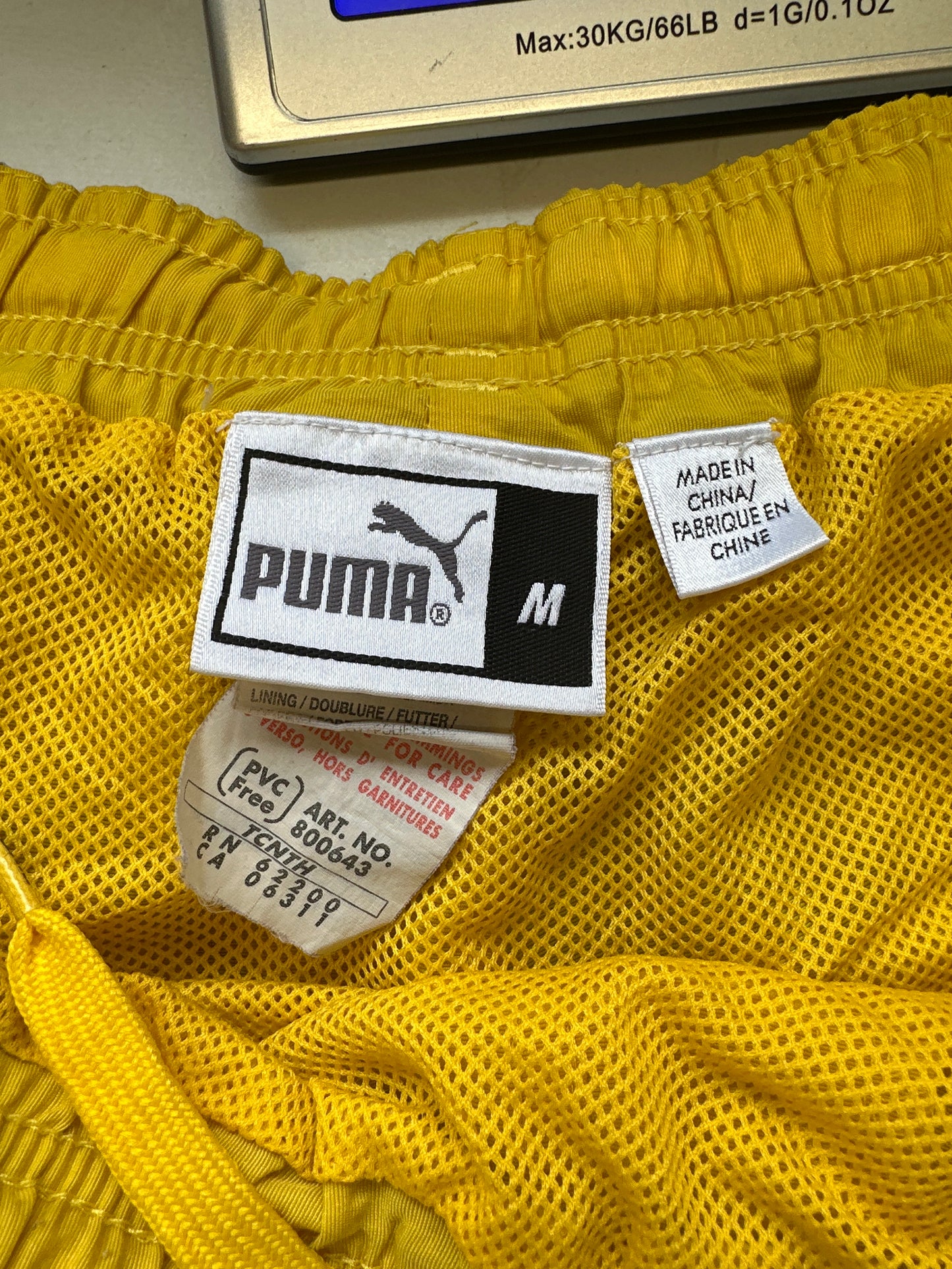 vintage yellow puma track shorts