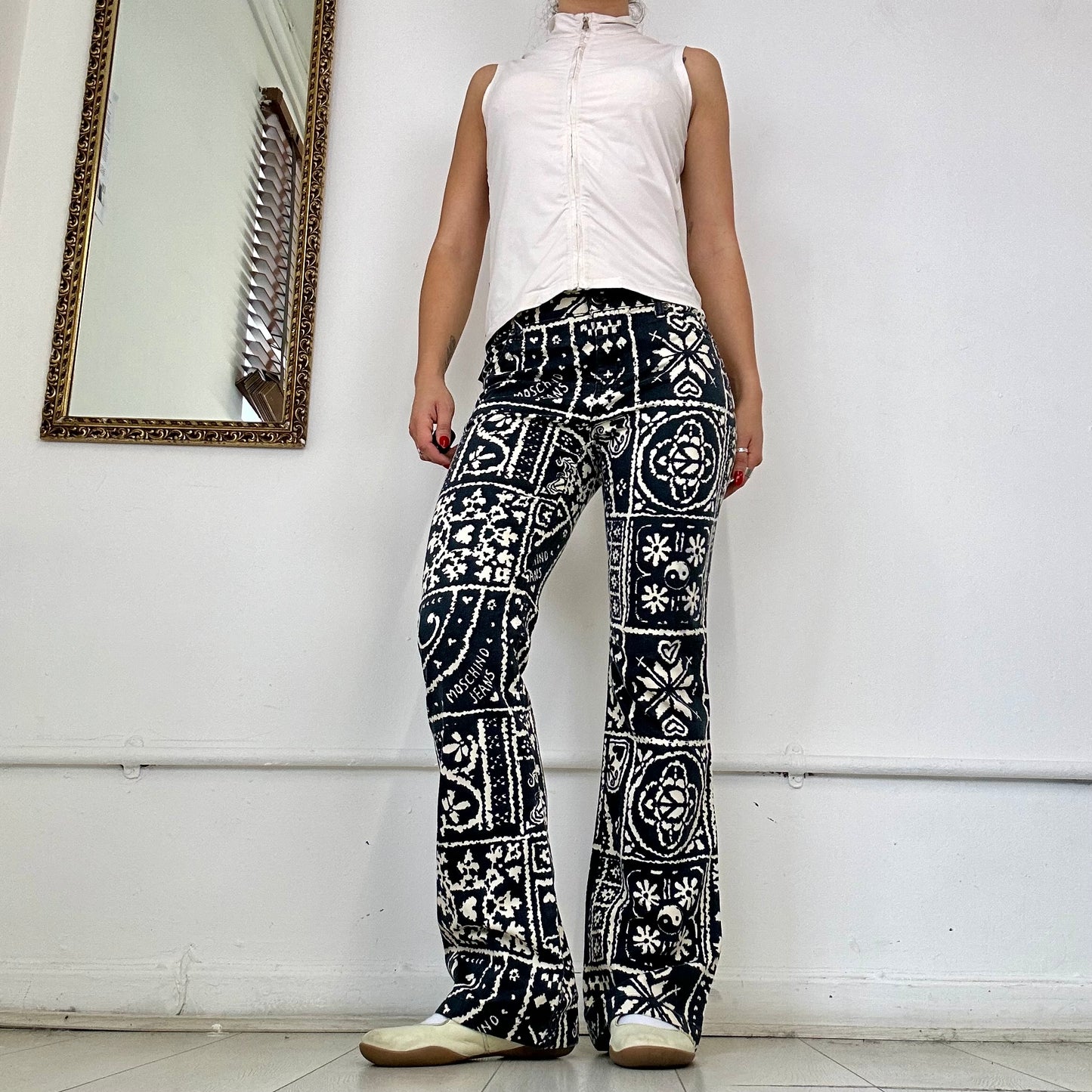 vintage moschino patterned flared trousers