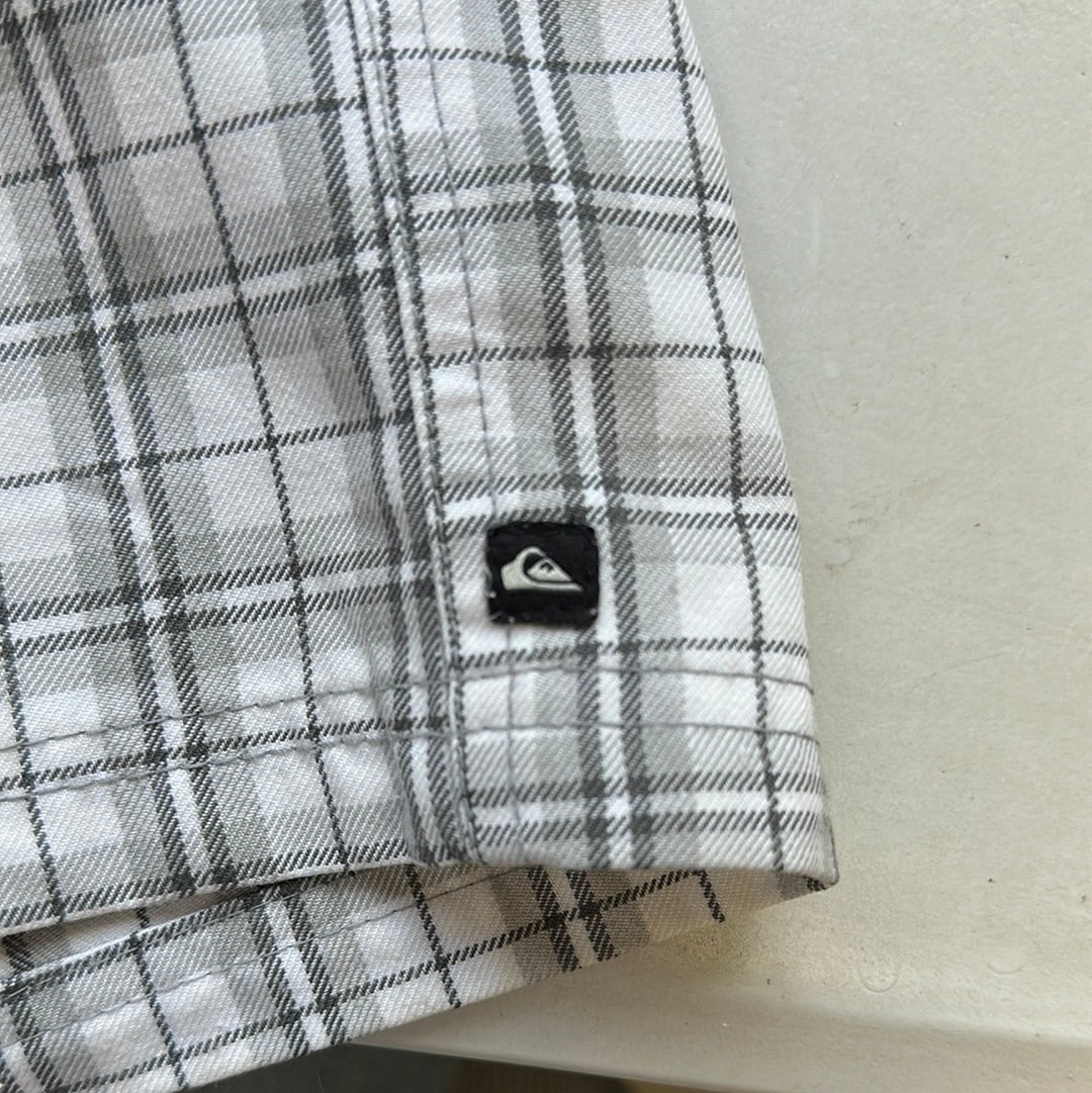 grey and white checkered shorts by quiksilver