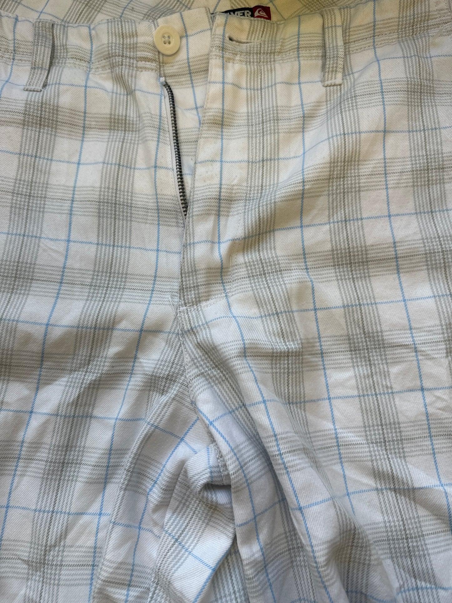 white checkered quiksilver long shorts