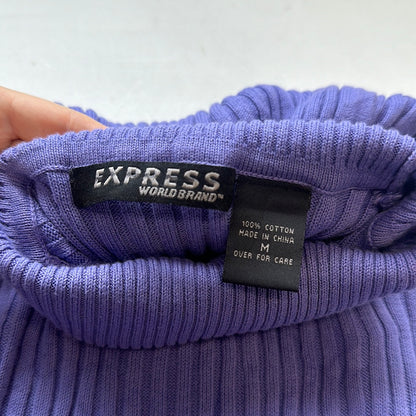 purple sleeveless knit top