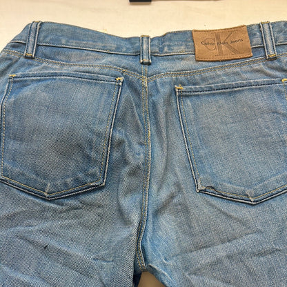 calvin klein mid wash flared jeans