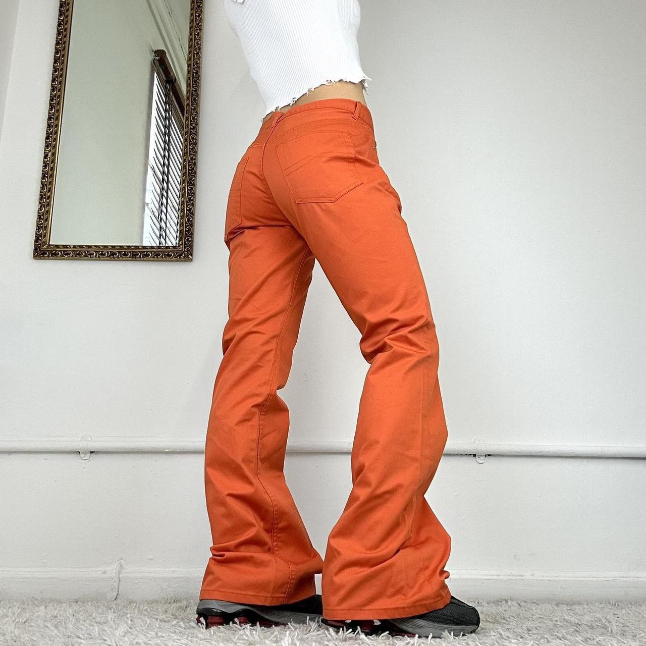 flared orange cargo trousers